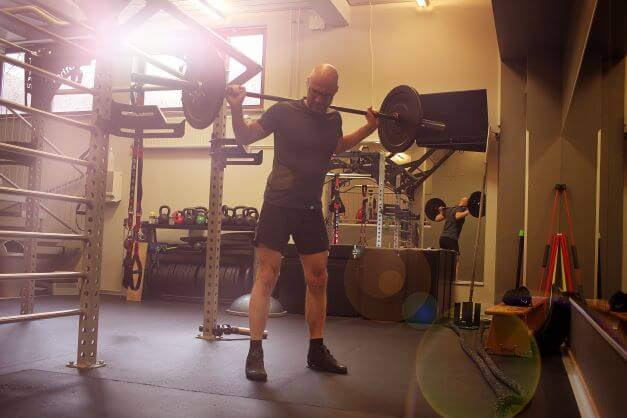 Man working out in basement gym