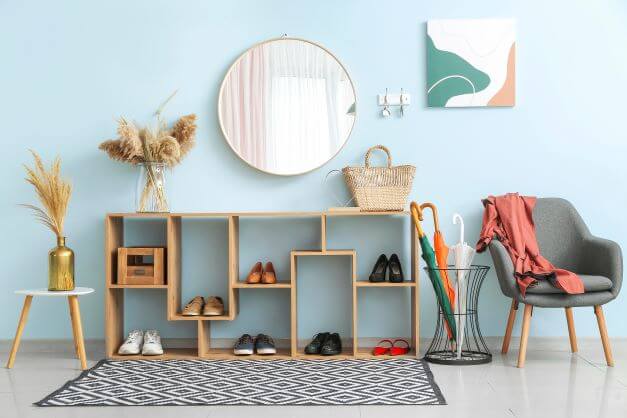 Modular shoe rack in natural wood colour