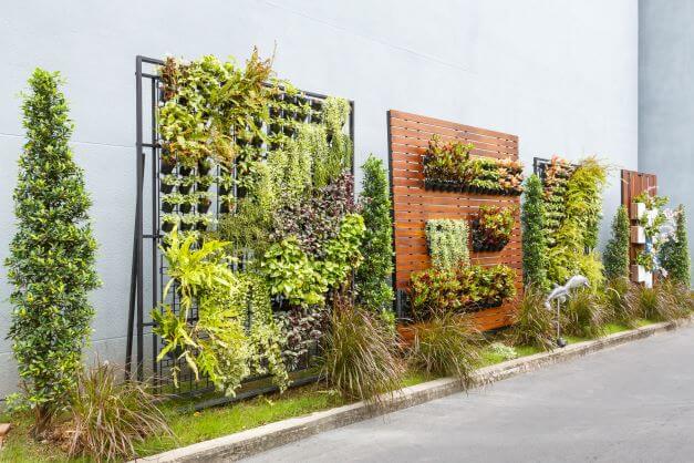 Just a few examples of vertical gardens which can maximise your outside space