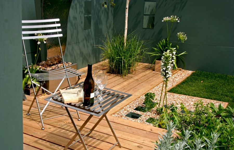 small garden space with patio and seating
