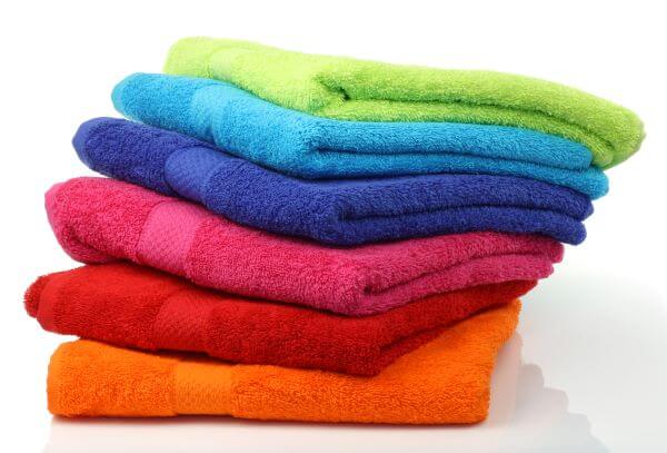 Bright coloured towels including red, green, blue and orange